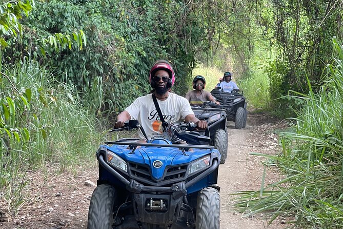 ATV and Bamboo Rafting with Transport from Montego Bay - Bamboo rafting on the river near Lethe