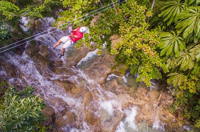 ATV, Horseback Ride, Zipline, Falls Climb + Lunch from Ocho Rios - ATV riding on Jamaican dirt trails