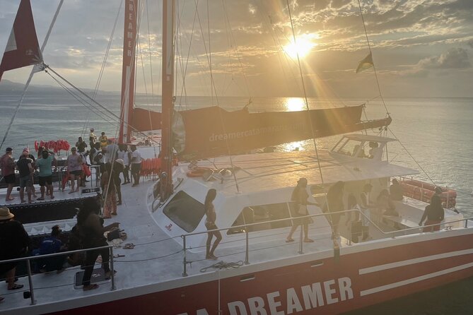 Bamboo Rafting, Catamaran Party Cruise and Ricks Cafe - Rick’s Café for 45 minutes at the West End Cliffs