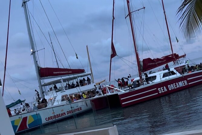 Bamboo Rafting, Catamaran Party Cruise and Snorkeling in Jamaica - Sunset at Ricks Café