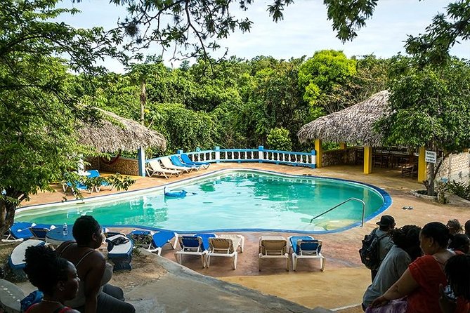 Blue Hole Mineral Spring and Rick's Cafe - Two very different Jamaican swimming stops