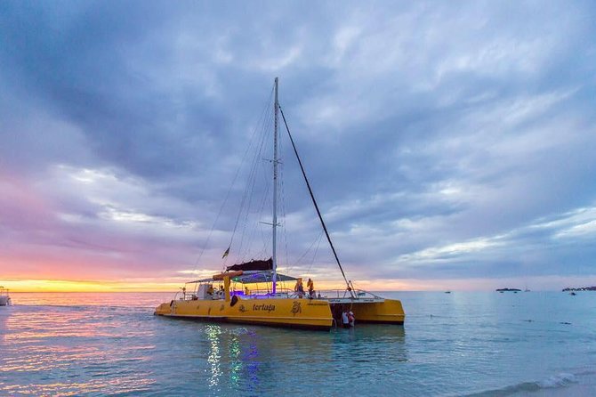 Catamaran Cruise Full Day Tour to Reef, Caves and Negril Beach - Snorkeling above coral and tropical fish