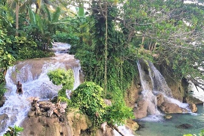 Dunn's Falls and Blue Hole Daytrip with Lunch from Montego Bay & Trelawny - Climbing Dunn’s River Falls, one step at a time