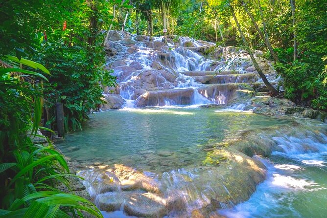 Dunn's River Falls , Bamboo Rafting & ATV Ride from Montego Bay - The Montego Bay to Ocho Rios transfer