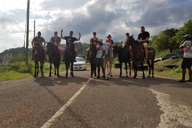 Dunn's River Falls, River Tubing, and Horseback Riding With Transportation - Floating the White River through bamboo