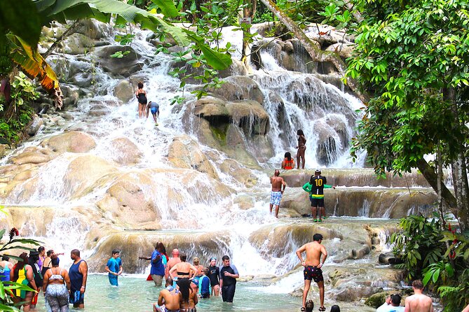 Dunn's River Park & Blue Hole Waterfall Combo from Montego Bay - Climbing the 960-foot Dunn’s River cascade
