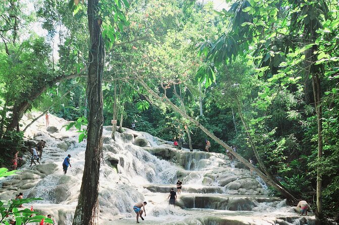 Dunns River Falls & Blue Hole Combo from Montego Bay with Pick Up - Climbing Dunn’s River Falls from sea to summit