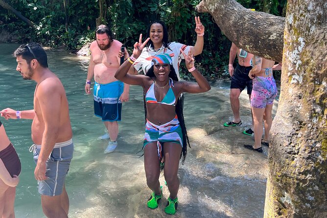 Dunns River Falls, Rafting, Zipline & Horseback from Montego Bay - A bamboo raft on the White River