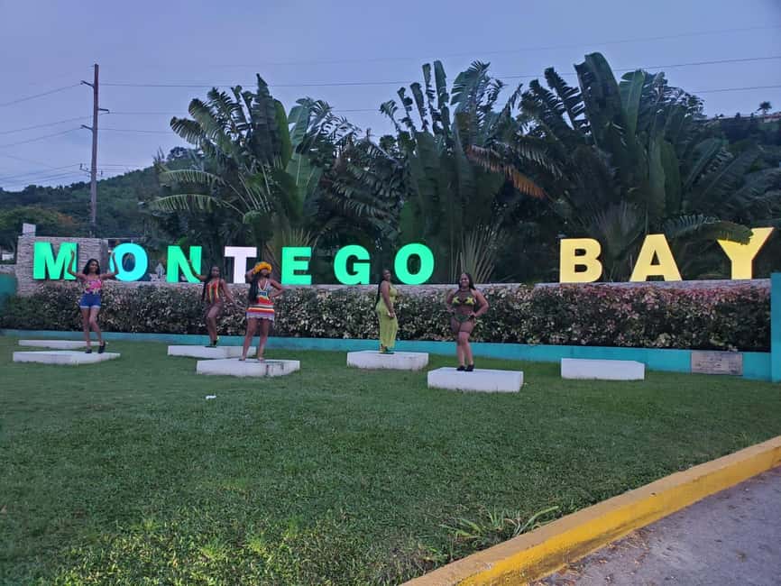From Montego Bay: Bamboo Rafting & Limestone Massage Tour - Fruit, music, drinks, and river stops