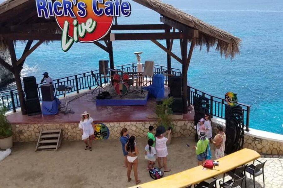 From Montego Bay: Negril Beach and Rick's Café Day Trip - Seven Mile Beach: Negril’s famous stretch of sand