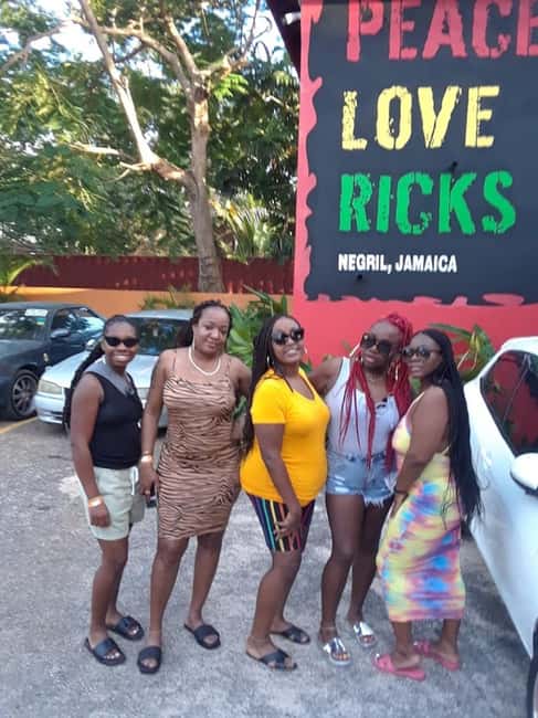 From Montego Bay: Negril Day Trip and Rick's Café Sunset - Seven Mile Beach: beautiful, busy, and not fully included