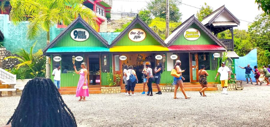 From Runaway Bay: Bob Marley Mausoleum Guided Day Trip - Entering Bob Marley’s childhood village