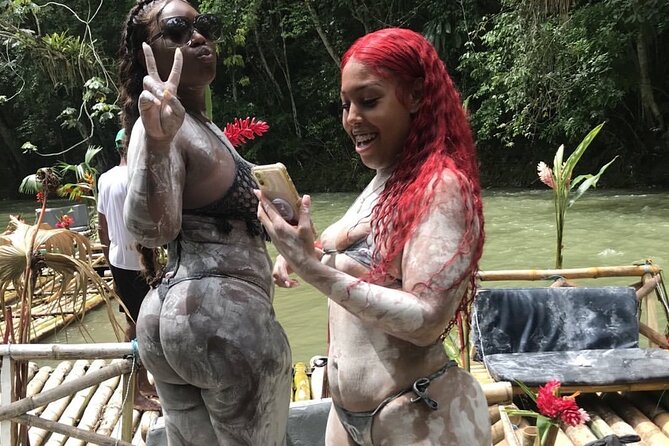 Great River Bamboo Rafting and Limestone Full Body Massage Tour From Montego Bay - Boarding the 30-foot bamboo raft