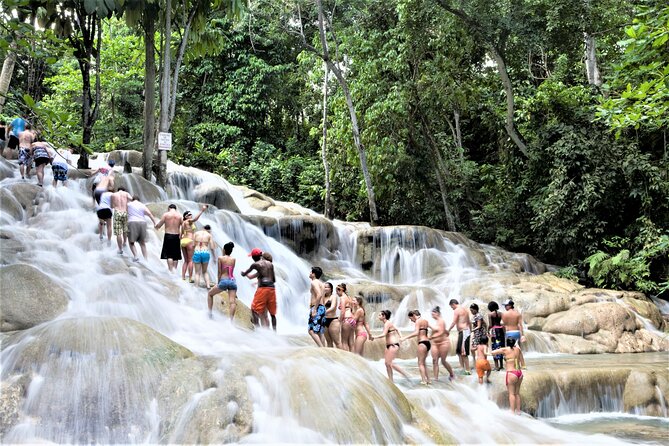 Green Grotto Caves and Dunn's River Falls Guided Tour with Admission - Scotchies Drax Hall brings jerk to the finish