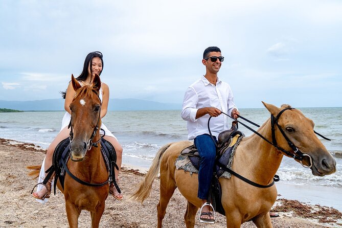 Half day Horse Back Riding and Bamboo Rafting Experience from Ocho Rios - Floating the White River on bamboo