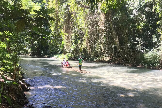 Jamaica Bamboo Rafting Tour Limestone Foot Massage - Timing, weather, and cancellation details