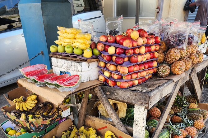 Jamaican Street Food and Rum Tasting Private Tour - Jerk chicken, patties, and fruit in the first stop
