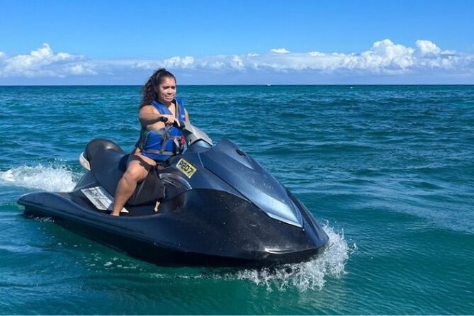 Jet Ski and Bamboo Rafting Limestone Massage From Montego Bay - Jet skiing on Montego Bay’s clear water