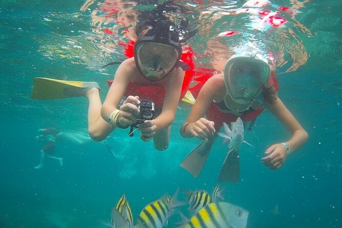 Montego Bay Catamaran: Snorkel Tour with Open Bar & Reggae DJ - The Jamaican open bar and light snacks