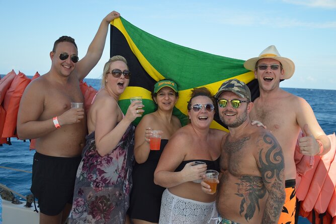 Montego Bay Catamaran: Snorkel Tour with Open Bar & Reggae DJ - The complimentary foot massage