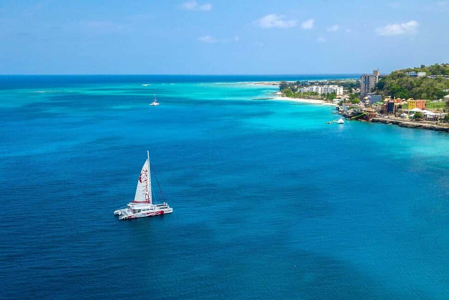 Montego Bay: Reggae Catamaran 18+ Cruise with Open Bar - Snorkeling over coral and fish