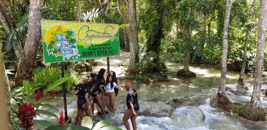Montego Bay: River Rafting and Dunn's River Falls Day Trip - Dunn’s River Falls: climbing water toward the sea
