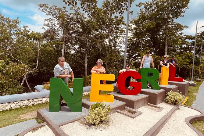Negril Glass Bottom Boat Tour+Snorkeling visit Booby cay island - Sunset and cliff jumping at Rick’s Cafe