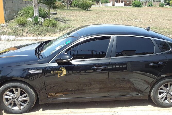 Norman Manley Airport to New Kingston - A private ride for up to five people