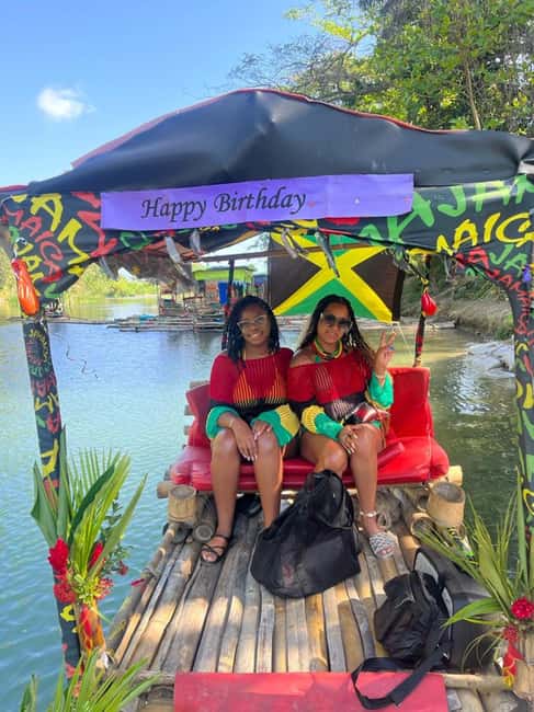 Ocho Rios : Bamboo River Rafting in Ocho Rios Jamaica. - Getting settled on a 30-foot bamboo raft