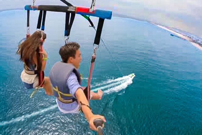 Parasailing above Turquoise Ocean Waters in Montego Bay - Flying above Montego Bay’s turquoise water