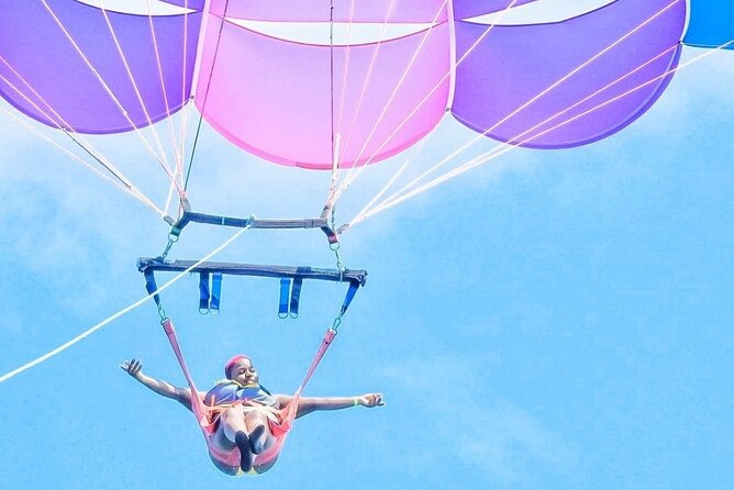 Parasailing, Blue Hole Mineral Spring, Seven Mile Beach - Private transport and named guides