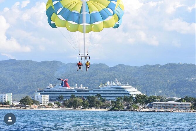 Parasailing, Sea Tubing & Jet Ski from Montego Bay- Private tour - Montego Bay views beyond the beach