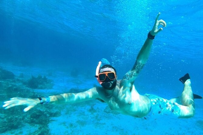 Party Catamaran Cruise with Open Bar and Snorkeling Montego Bay - Snorkeling near Montego Bay’s coral reef