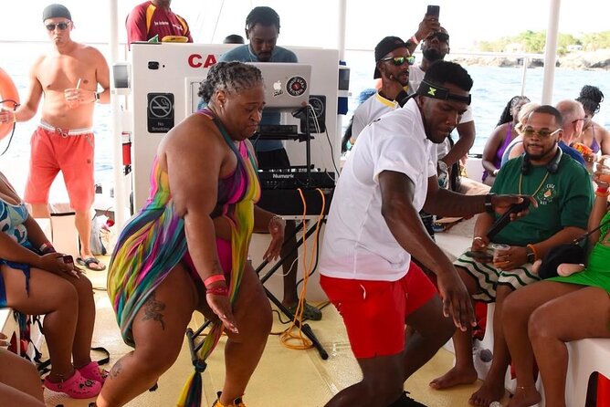 Party Catamaran: OpenBar, Music, Negril Beach, Caves, Snorkeling - Weather can change the entire day