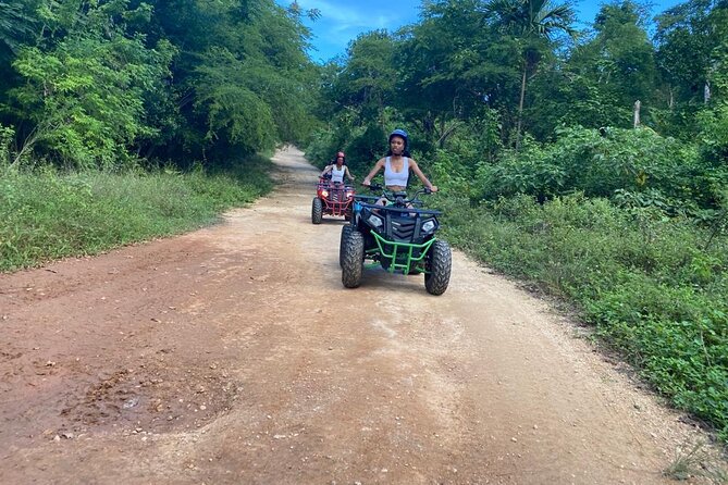 Private ATV Ride 7 Mile Beach & Rick’s Café Negril Tour - Jerk chicken lunch in an open-air setting