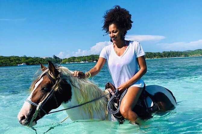 Private Horseback Riding, Swim & Blue Hole Secret Falls - Riding horses and entering the sea