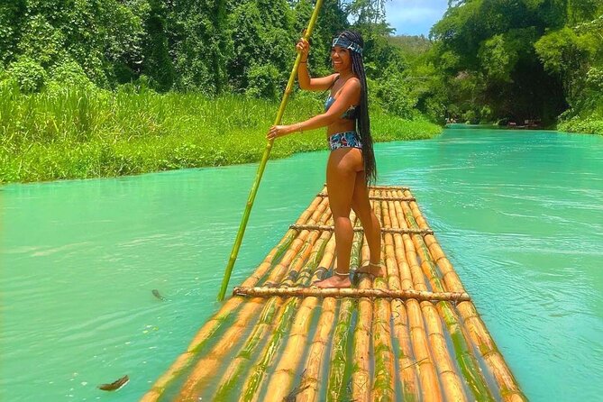 Private Martha Brae Bamboo Rafting Tour with Private Transfer - Meeting the raft captain on the water