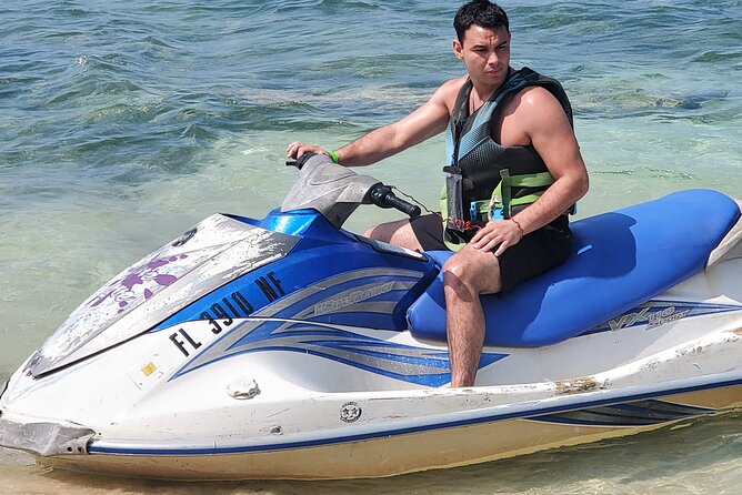 Private Parasailing and Jet Skiing at Montego Bay - Taking the Controls on a Jet Ski