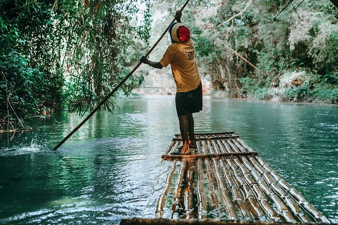 Rio Nuevo Bamboo River Rafting & Dunn's River Falls - Floating through Rio Nuevo on bamboo