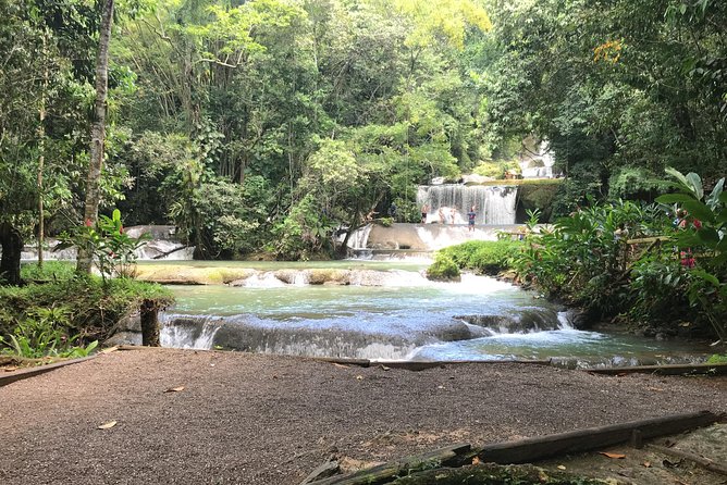 YS Falls Private Full-Day Adventure Tour with Pickup - Arriving at YS Falls and reaching the water